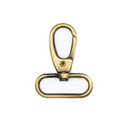 Antique gold tone clasp displayed with various DIY craft supplies.