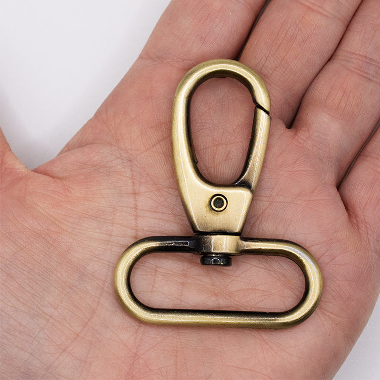 Swivel clasp shown in use on a keychain with keys.