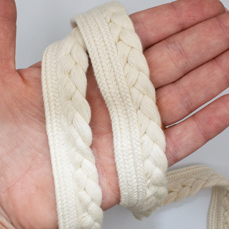 Close-up of 23mm wide cream pipe trim showing plait detail.