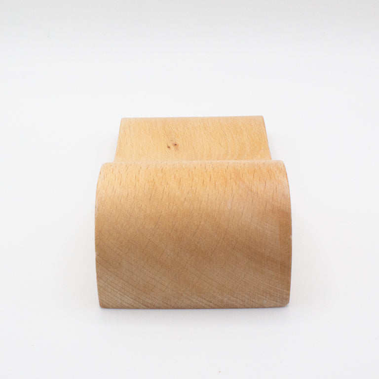 Close-up of the beech wood tool designed for watch strap shaping.