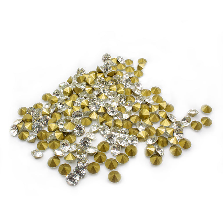 Pack of 144 clear crystal rhinestones, 7mm size, displayed in a container.
