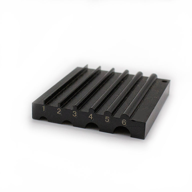 Steel leather edge beveler showing 6mm wide rounded sides.
