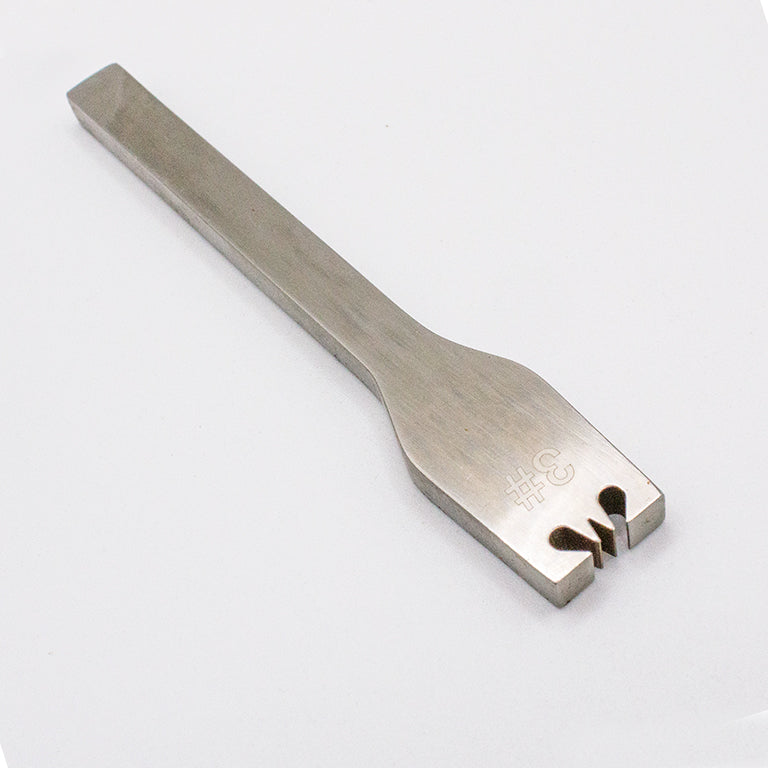 Zipper tool pliers demonstrating gear removal