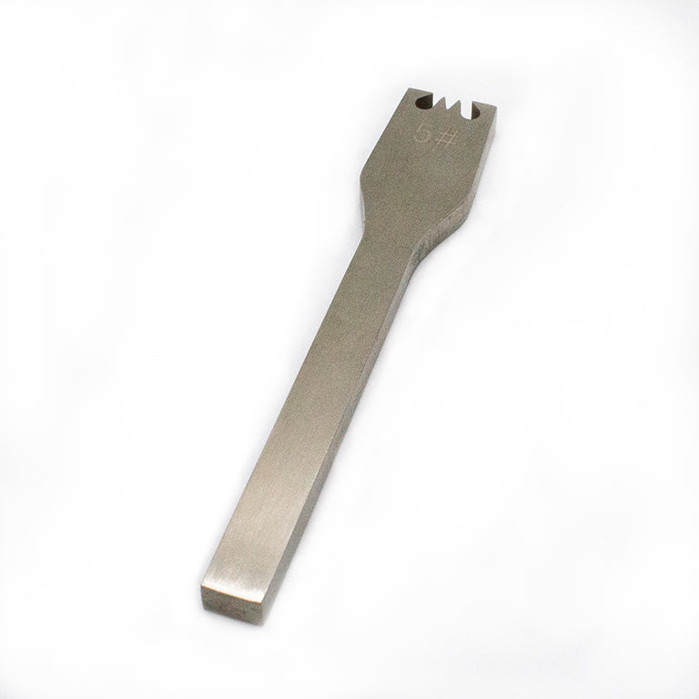 Zipper tool in use on a leathercraft project