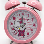 Close-up of the pink cartoon design on the alarm clock