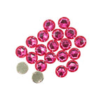 Close-up of a 12mm hot pink acrylic rhinestone showing its flat back.