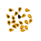 Two pre-drilled holes for sewing on the emerald green rhinestone