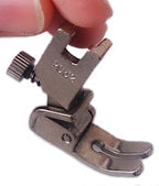 Industrial sewing machine gathering foot on a sewing machine