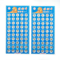 Close-up of silver metal clip buttons, 8mm wide, for sewing projects.