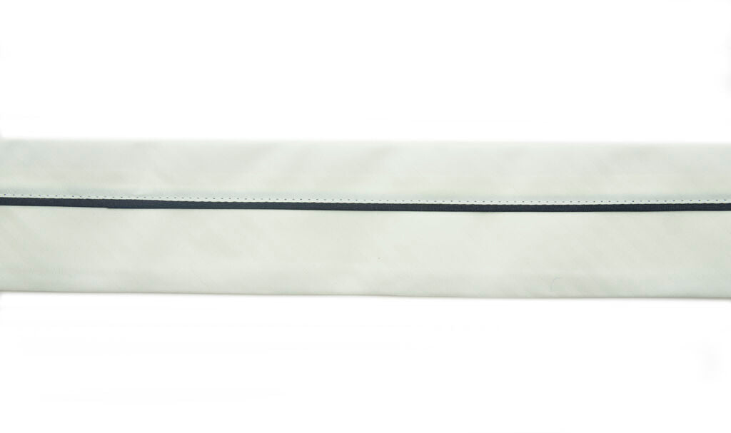 Classic white tailor waist band displayed on a flat surface.