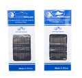 Three self threading needles of different sizes on a white background.