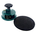 Round cutter for textile GSM sampling on a cutting mat.