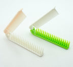 Compact pocket comb with dual colour design