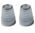 Two Slip-Stop silver finger tip thimbles displayed on a white background.