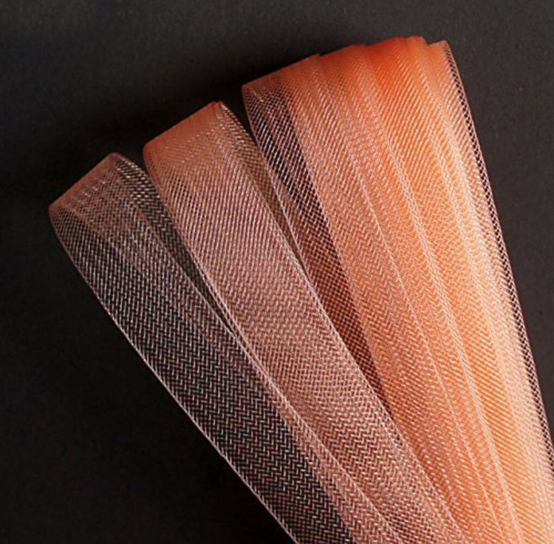 Salmon pink nylon crin trim displayed on a white background