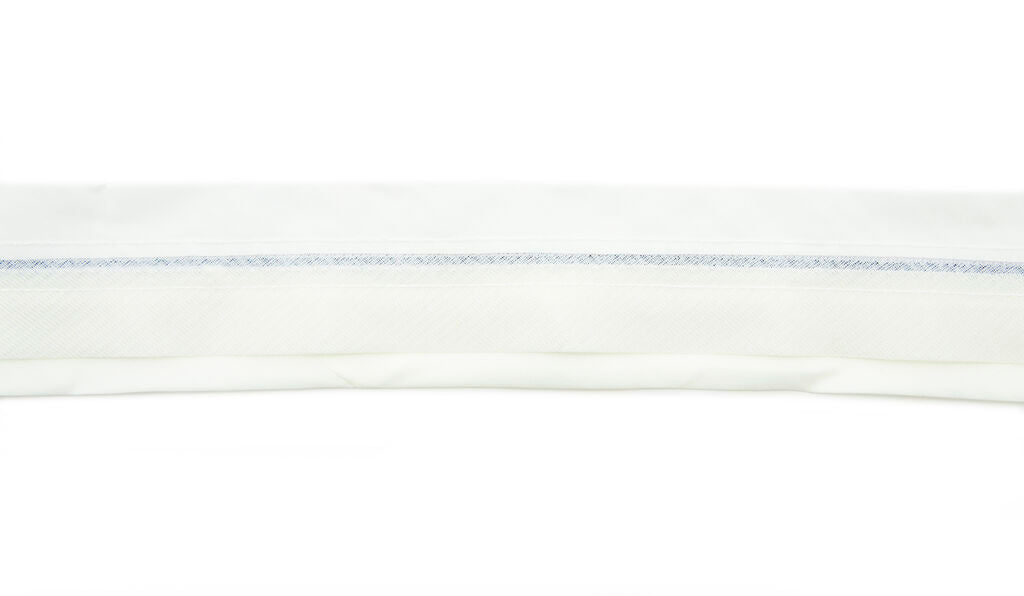 Close-up of the cream classic stripe tailor waist band fabric.