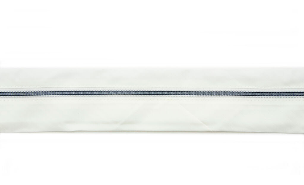 Cream classic stripe tailor waist band displayed on a roll.