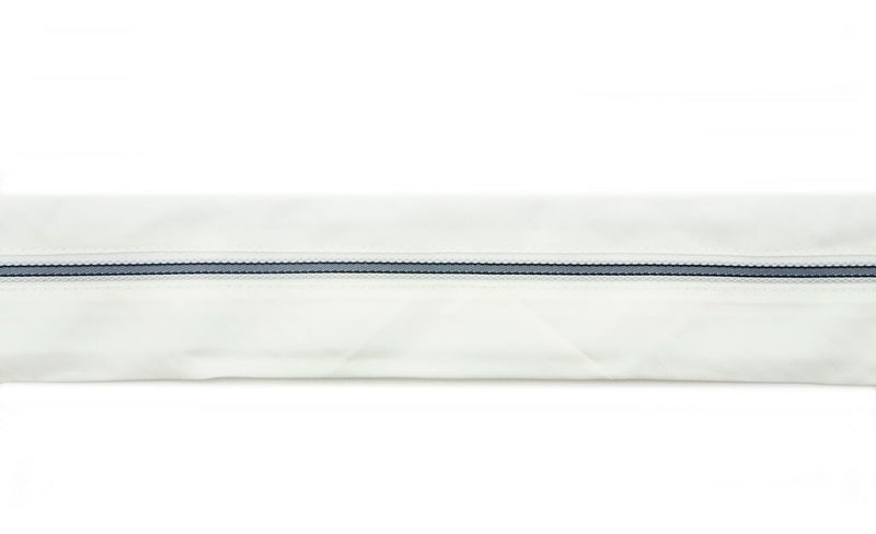 Cream classic stripe tailor waist band displayed on a roll.