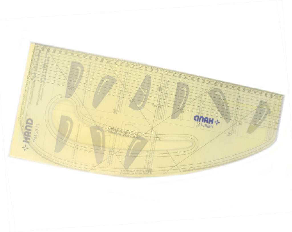 Pattern marking ruler showing curves for necklines and sleeves.
