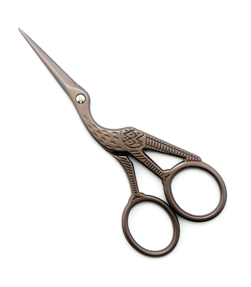 Classic large forged stork embroidery scissors with antique finish.