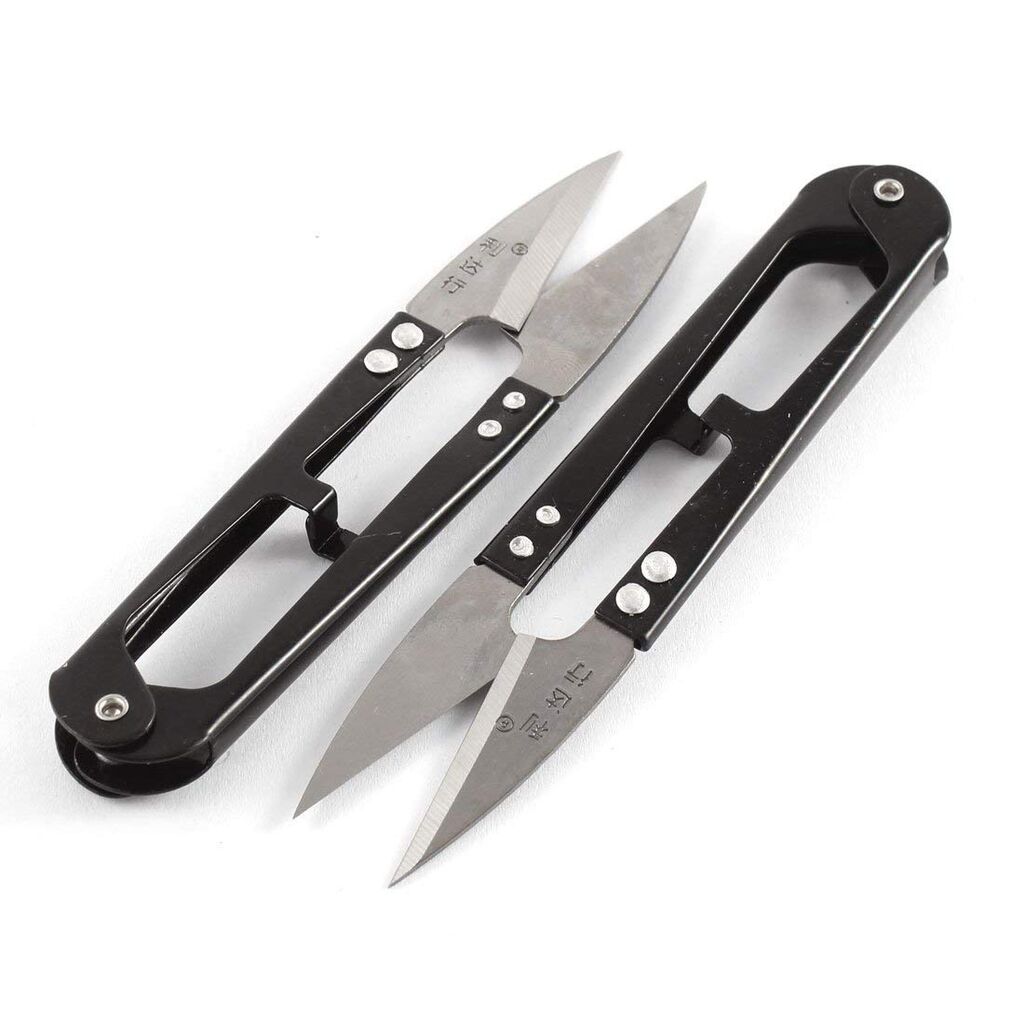 Side view of the snips highlighting ergonomic handles