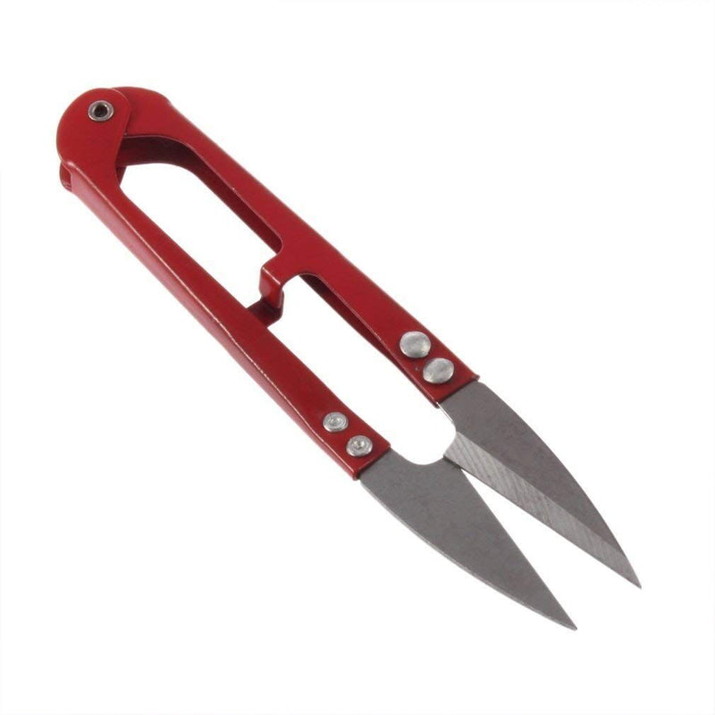 Close-up of thread and unpicking snips showing sharp blades