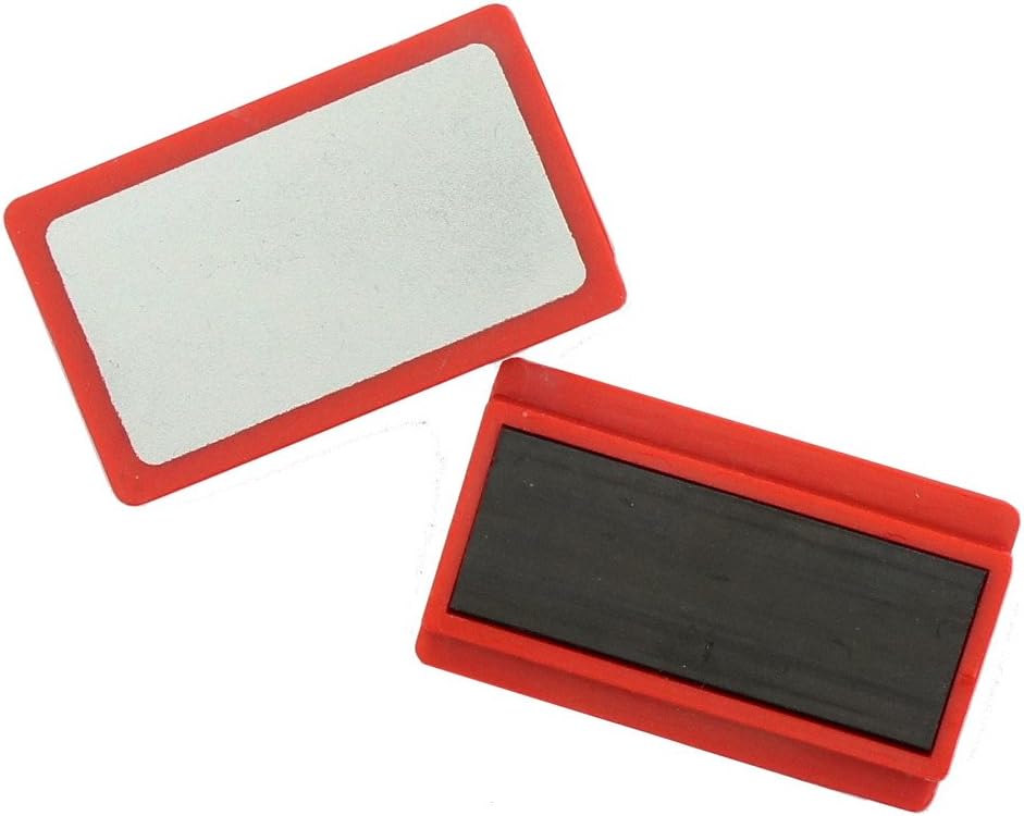 Various colours of magnetic badge holders: red, blue, green, yellow.