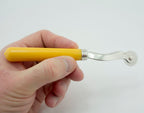 Close-up of the serrated edge of the tracing wheel for accurate marking.