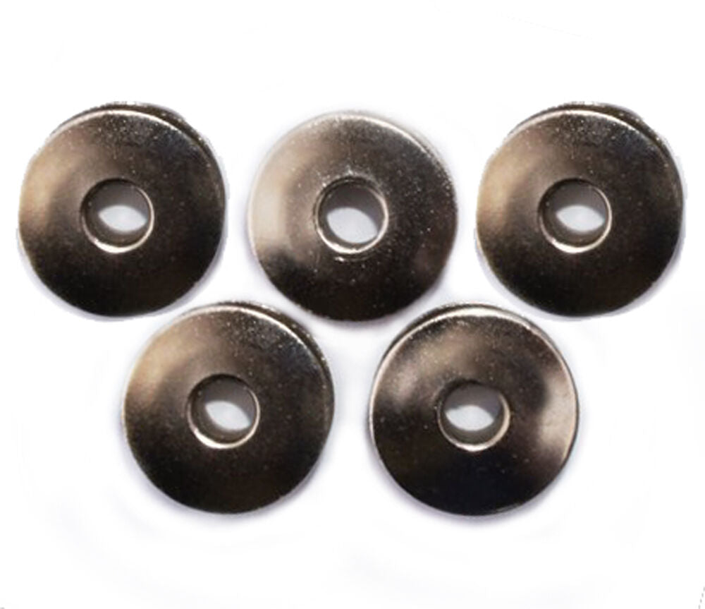 Set of 3 lockstitch bobbins for sewing machines.