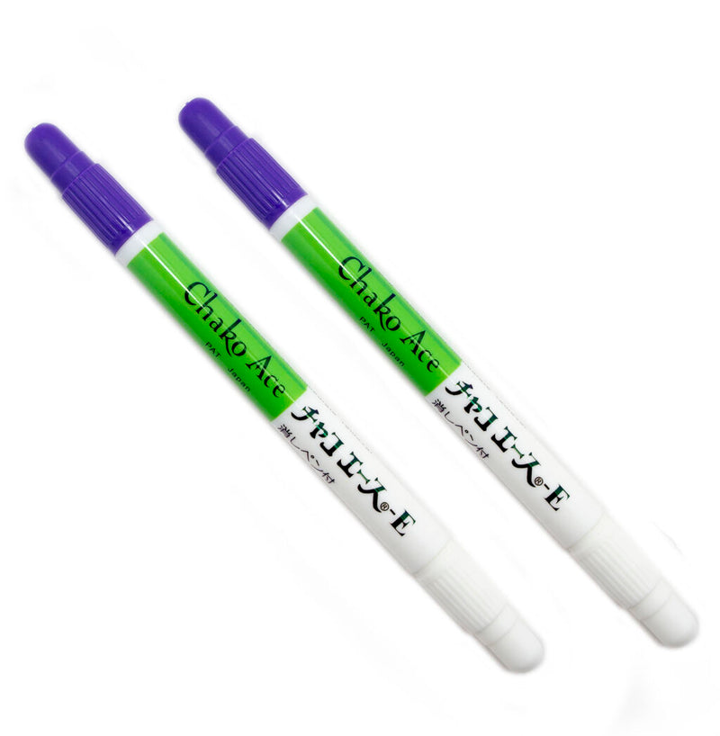 Two water soluble purple fabric marker pens with erasers