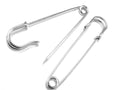 Three extra large silver kilt pins displayed together.