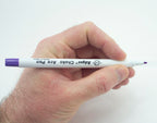Marker pen demonstrating erasable ink on fabric