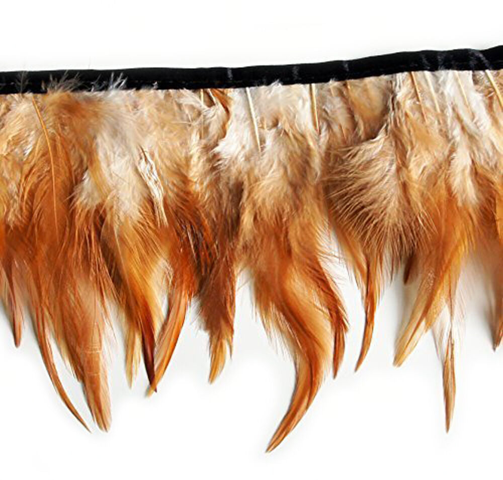 Natural brown and white rooster feather fringe trim on a roll.
