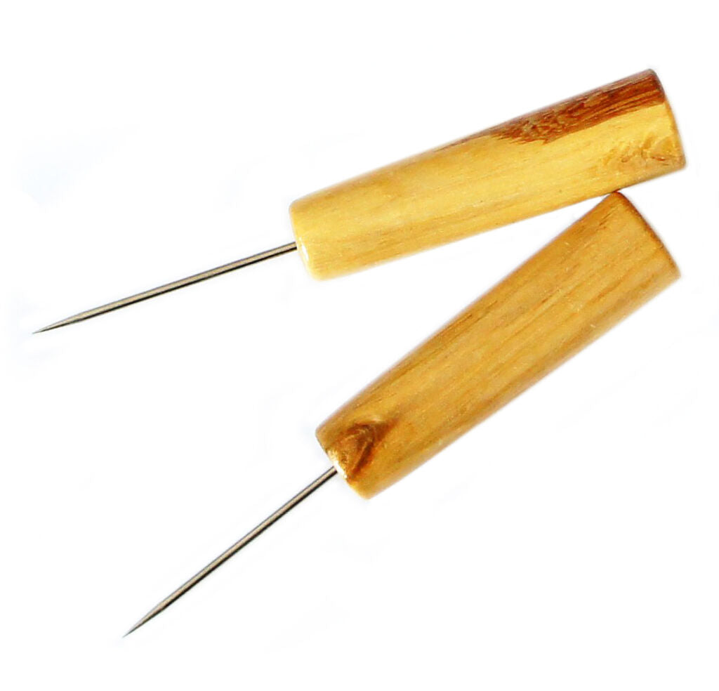 Two medium duty wooden le clickers awls on a white background.
