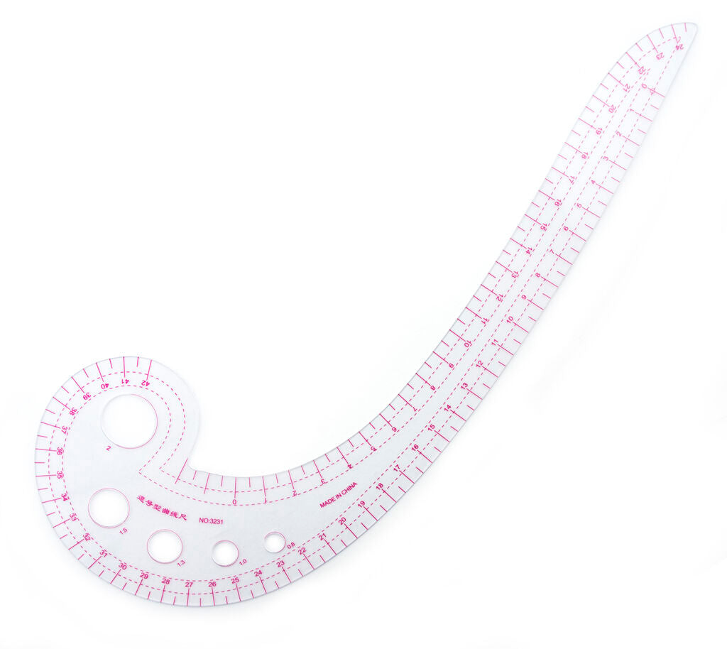 Comma shape curve line pattern ruler on a white background.