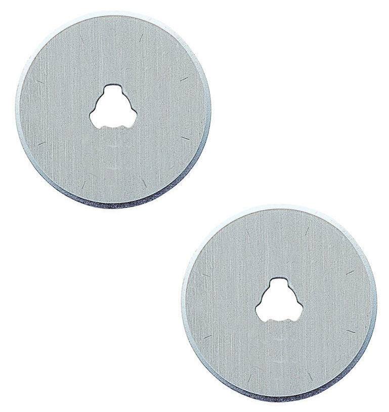 Two 28mm rotary blades in packaging for quilting and crafting