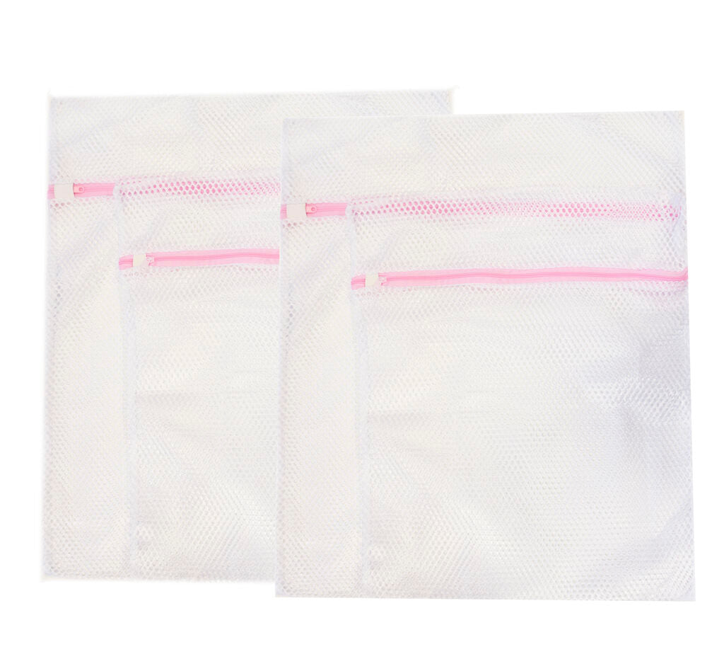 Four large tough zipped laundry bags in white, two sizes included.