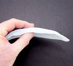 Close-up of narrow width white shoulder pads for sewing