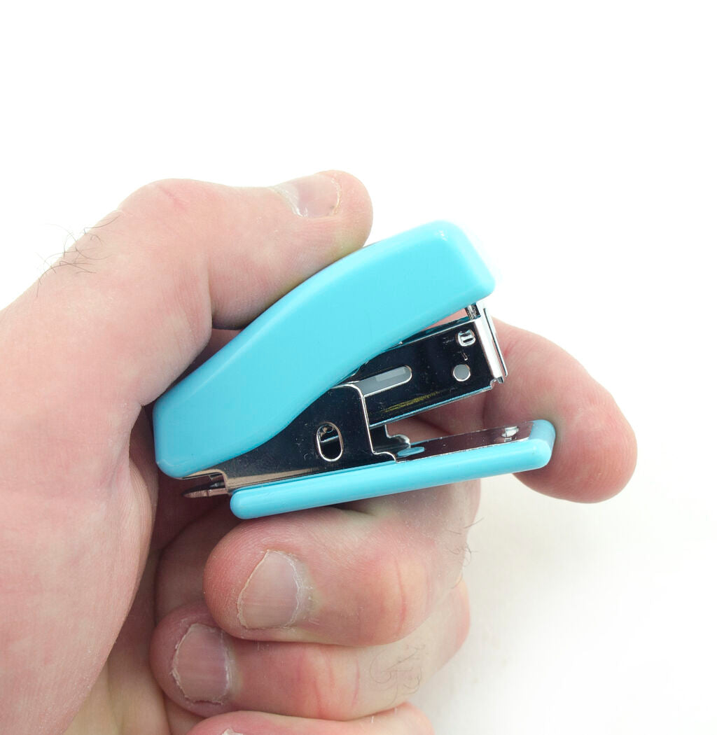 Close-up of the mini stapler in a vibrant colour.