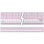 Ruler displayed with sewing patterns and fabric samples