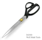 Close-up of stainless steel blades of the tailors scissors.