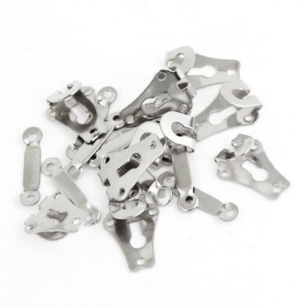 Close-up of silver trousers and skirt hooks/bars, ideal for garment fastening.