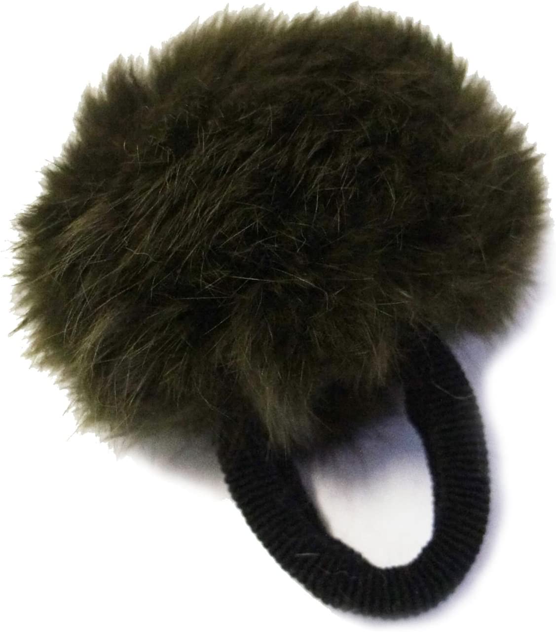 Close-up of decorative pom poms on a hair band in assorted colours.