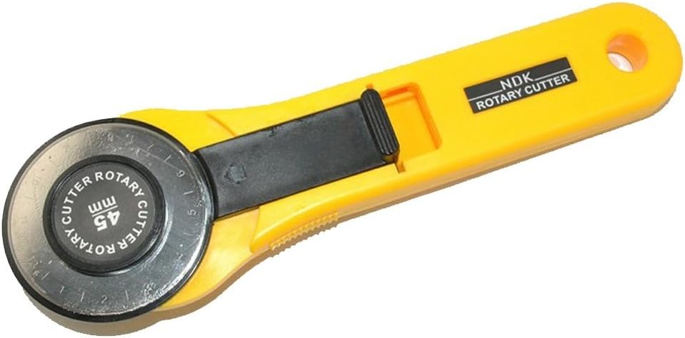 Close-up of the rotary cutter blade showing sharpness