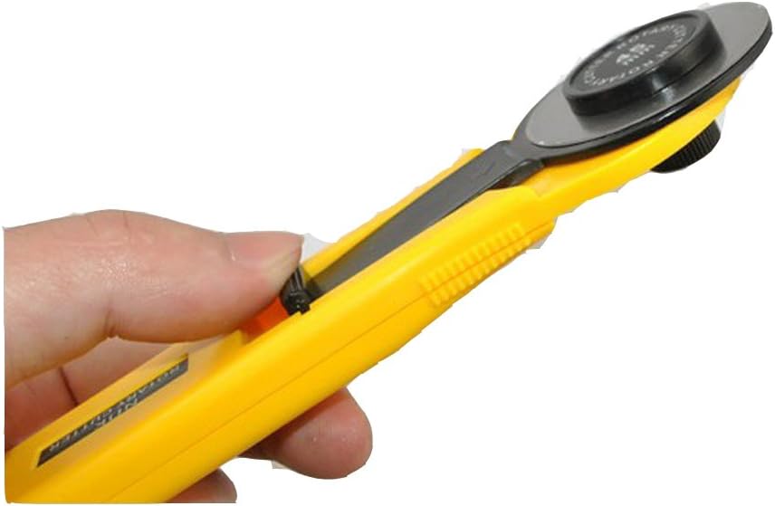User demonstrating the rotary cutter in action