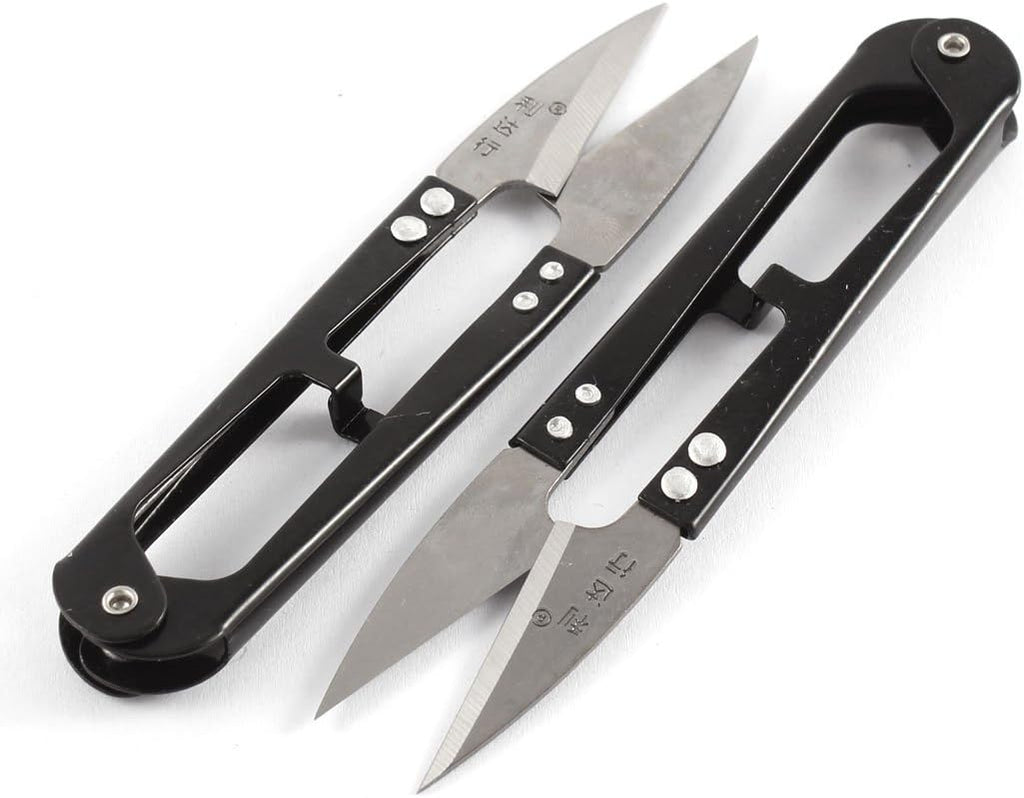 Twin thread snips with ergonomic handles for comfortable use.