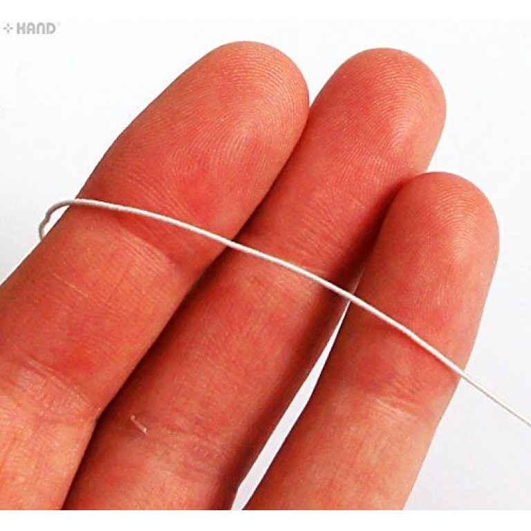 A Large Roll of Shirring Elastic Off White 1mm - Appx 800 metres per roll A Large Roll of Shirring Elastic Off White 1mm - Appx 800 metres per roll