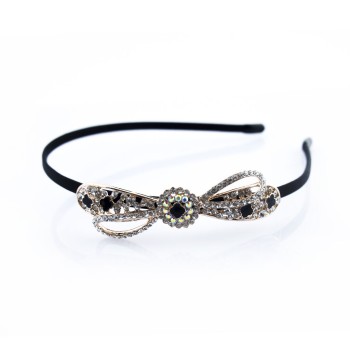 HAND® Stylish Black Head Band with a Pretty White Crystal and Black Enamel Bow Motif