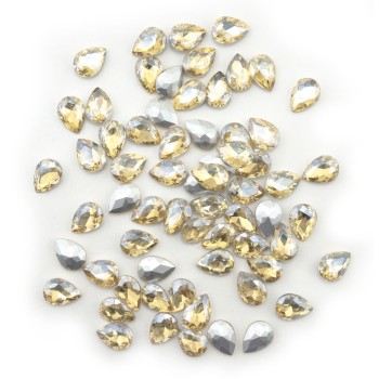 HAND® Golden Champagne Crystal Glass Teardrop Sew On Embellishments with Silver-Grey Tone Backing - 10 x 14mm - Pack of 50 HAND® Golden Champagne Crystal Glass Teardrop Sew On Embellishments with Silver-Grey Tone Backing - 10 x 14mm - Pack of 50
