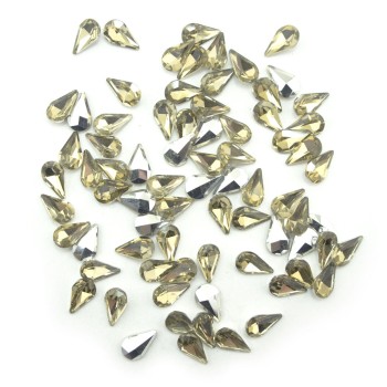 HAND® Golden Champagne Crystal Glass Teardrop Sew On Embellishments with Silver-Grey Tone Backing - 8 x 13mm - Pack of 50 HAND® Golden Champagne Crystal Glass Teardrop Sew On Embellishments with Silver-Grey Tone Backing - 8 x 13mm - Pack of 50